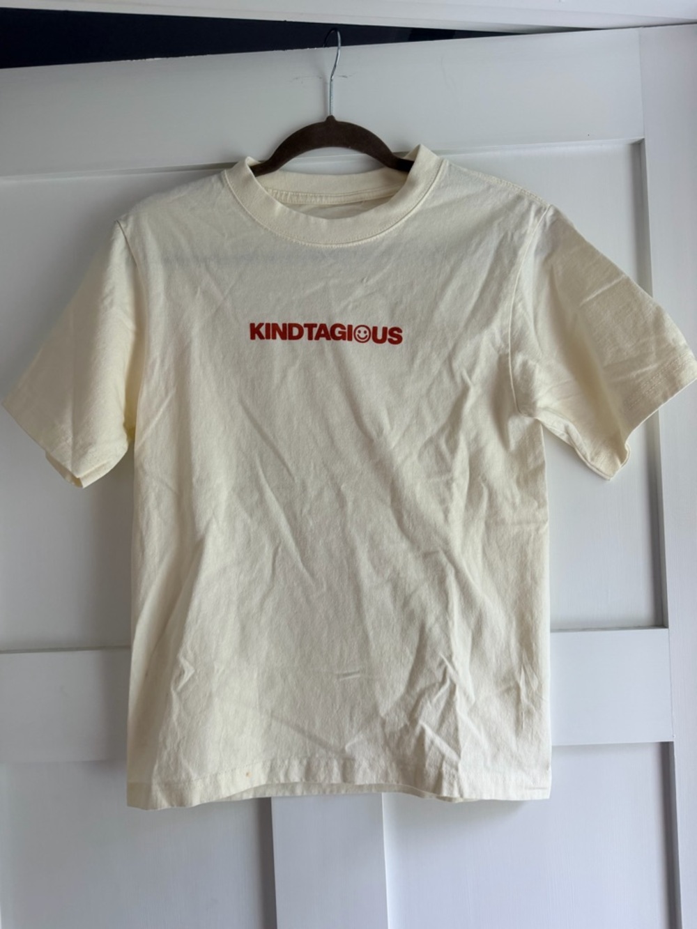 KINDTAGIOUS cream white tshirt